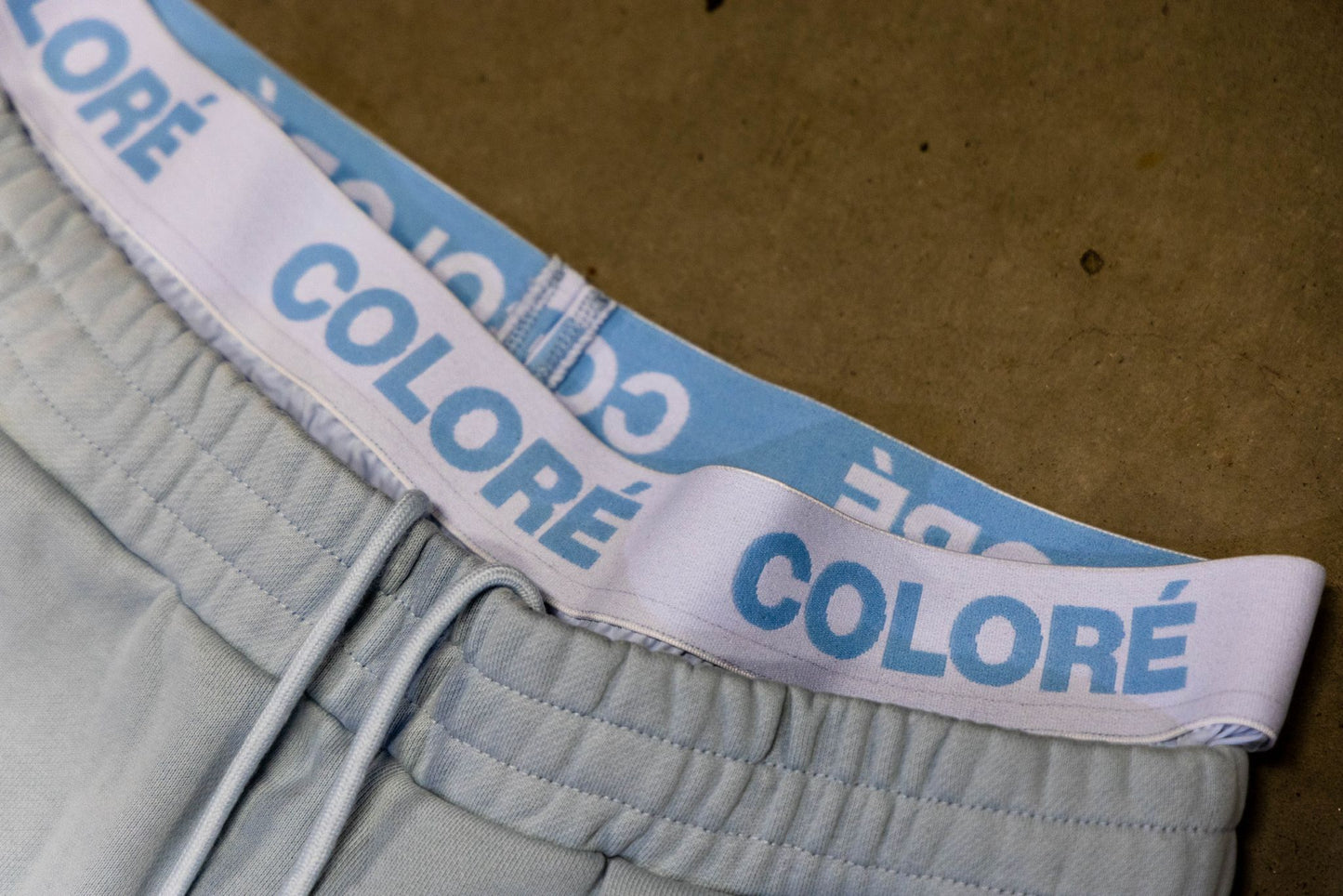 COLORÉ DENIM FLARED SWEATS.